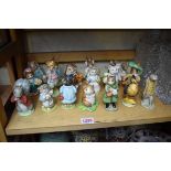A collection of nineteen Beatrix Potter figures. (19)