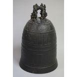 A Chinese bronze temple bell, probably Ming, 27cm high.