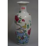 A Chinese famille rose vase, probably late 19th century, painted with a bird and butterfly amongst