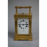 A good gilt brass carriage clock, the enamel dial inscribed 'C Packer & Co, 76 & 78 Regent St', with
