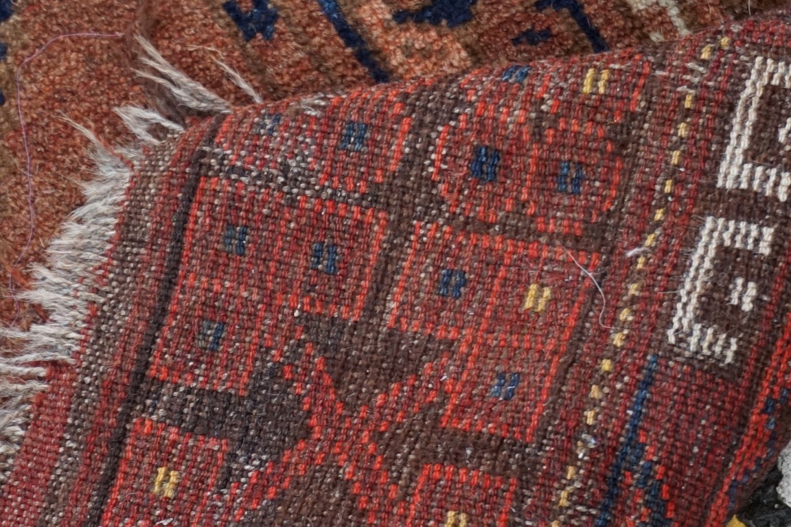 (THH) An Afghan rug, having eight central medallions, with geometric borders, 224 x 126cm. - Image 3 of 8