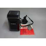Cameras: a Yashica MAT-124G, with lens, leather case and instruction book.