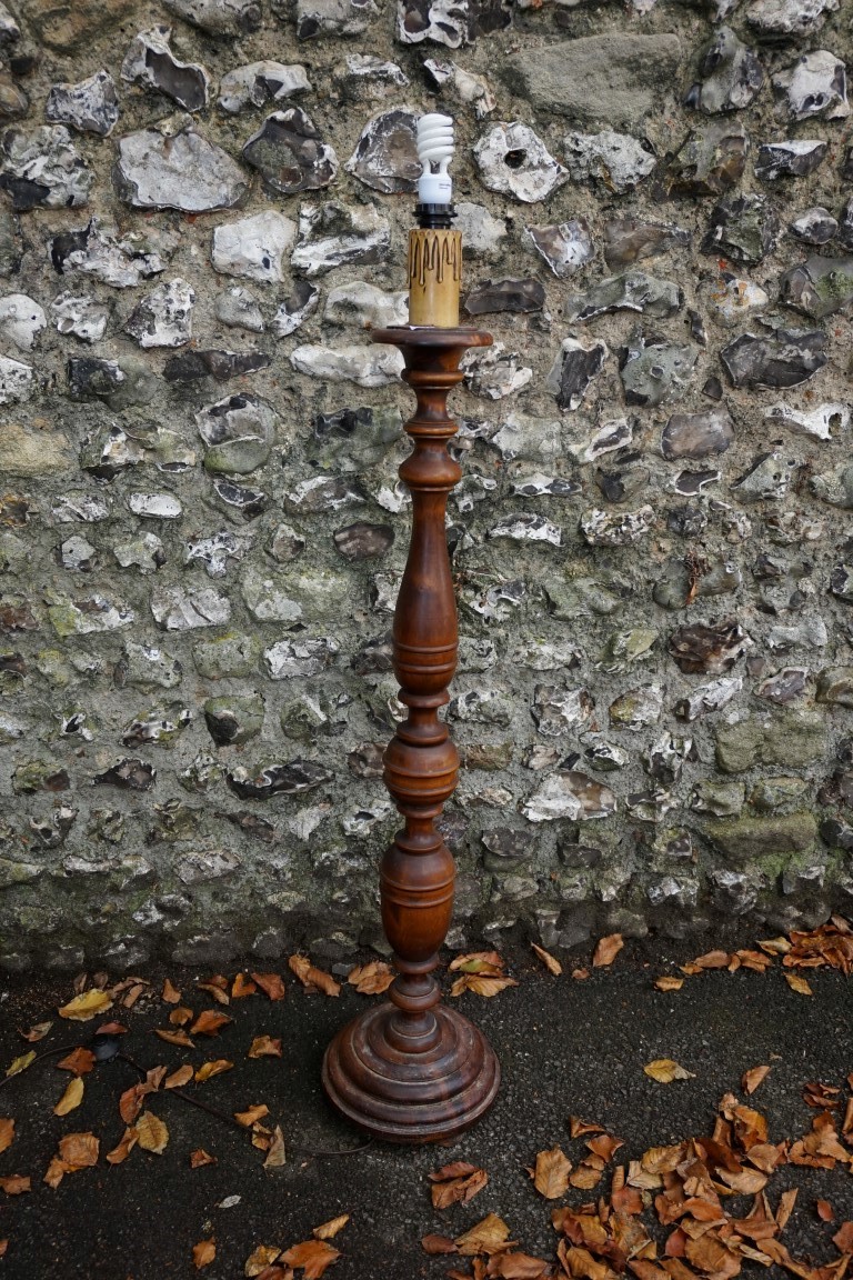 A stained wood standard lamp. This lot can only be collected on Saturday 19th December (9-2pm).