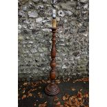 A stained wood standard lamp. This lot can only be collected on Saturday 19th December (9-2pm).