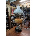A Victorian oil lamp, height excluding chimney 52.5cm.