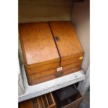 A Victorian oak stationary casket, 37cm wide.