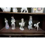 Five Lladro figures, largest 24cm.