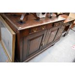 An 18th century oak dresser base, 125cm wide.