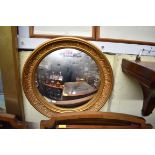 A reproduction gilt framed convex wall mirror, 38cm diameter.