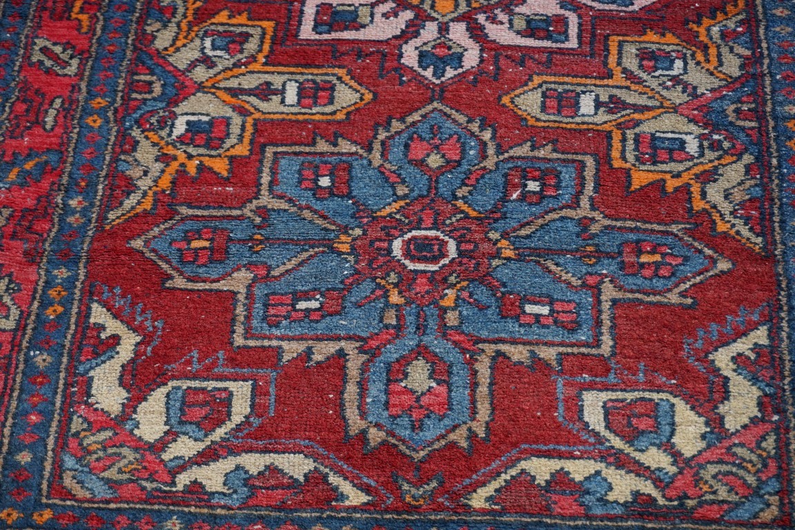 A Persian rug, having three floral medallions with geometric borders, 180 x 104cm. - Image 2 of 3