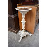 (THH) A Victorian white painted cast iron tripod stand, 74cm high.