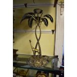 A electroplated table centrepiece, possibly Elkington, modelled with a giraffe and palm tree, 50.5cm