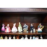 Six Royal Doulton figures, to include: 'Maytime', HN2113; together with a Tuscan china figure of '