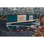 (THH) An old Chas Lancaster leather gun case; together with five various walking and shooting