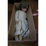 An antique German bisque head doll, impressed '109-12 DEP'.