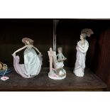 Three Lladro figures, largest 28cm high.