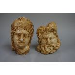 A pair of carved marble classical busts, largest 18.5cm long.
