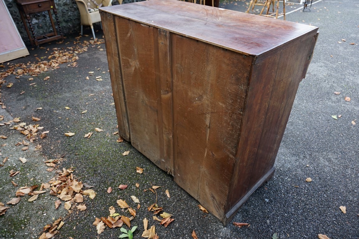 An antique oak chest of four drawers, converted from a secretaire, 101cm high x 98cm wide x 53cm - Image 6 of 7