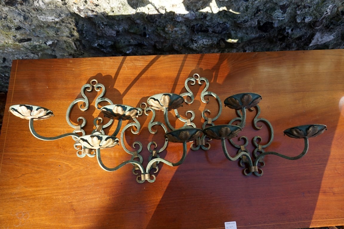 Four matching wrought iron wall tealight holders. This lot can only be collected on Saturday 19th