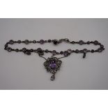 An antique Continental amethyst and seed pearl necklace, the clasp stamped 935.