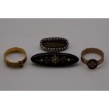 A small collection of mourning jewellery, comprising; a plaited hair and enamel gold ring, stamped