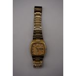 A 1970s Seiko SQ 4004 gold plated quartz day date wristwatch, 35mm.