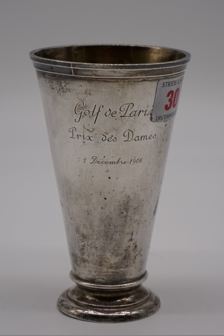 A French white metal golf trophy, by Andre Aucoc, inscribed ' Golf de Paria, Prix des Dames, 1