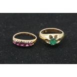 An amethyst gypsy set gold ring, hallmarked 15ct; together with an emerald set example, stamped 585.