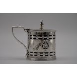 An Edwardian pierced silver drum mustard, by William Aitkin, Chester 1901, having bright cut
