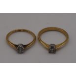 Two solitaire diamond gold rings, both hallmarked or stamped 375/9ct and plat, 4.9g gross weight.