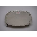 A silver square salver, by Harrods Ltd, London 1937, 20cm, 356.5g.