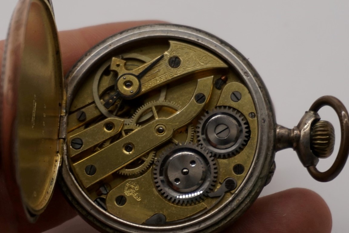 An early 20th century Hertha .800 open faced stem wind pocket watch, 47mm. - Image 5 of 6
