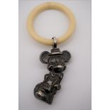 A vintage .925 novelty 'Mickey Mouse' teething ring, having synthetic ring, 6cm.