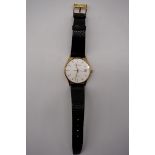 A 1990s Mappin & Webb 9ct gold quartz wristwatch, 34mm, having ETA movement, on original black