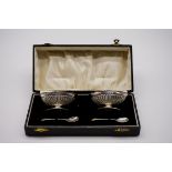 A cased pair of Victorian silver salts, by Minshull & Latimer, Birmingham 1895, 46.5g, (plated
