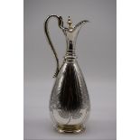 A Victorian silver gilt lined claret jug, by S Smith & Son, London 1869, 32cm high, 809g.