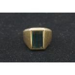 A large emerald cut tourmaline gold ring, hallmarked 750, 18.1g gross weight.