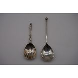 A Victorian silver apostle caddy spoon, makers mark indistinct, London 1874, 10.5cm; together with a