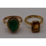 A rectangular topaz gold ring; together with an oval jade example, both 14k, 10.6g gross weight.