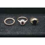 Three gem set rings, two hallmarked 375/9ct, the other gold plated on silver