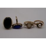 Four various gem set gold rings, hallmarked or stamped 9ct/375.