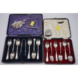 A cased set of six teaspoons and sugar tongs, by CJ DF, London 1914/5; together with another cased