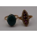 A ruby and diamond gold ring; together with an oval jade example, both stamped 18ct/18k, 7.4g