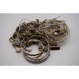 A quantity of silver and other metal jewellery, to include bangles; necklaces; and rings.