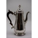 THIS LOT IS WITHDRAWN: A George II silver coffee pot, by John Payne, London 1764, 26cm high,