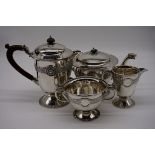 An Irish silver Celtic Revival three piece tea set, by Mappin & Webb Ltd, Dublin 1917; together with