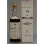 A 26 2/3 fl.oz. bottle of The Macallan 8 year old whisky, 43% abv, in original card box.