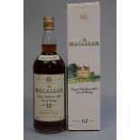 A 1 litre bottle of The Macallan 12 year old whisky, 43% abv, 1980s/1990s bottling, in original card