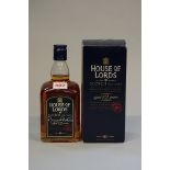 A 70cl bottle of House of Lords 12 year old blended whisky, autographed by Margaret Thatcher, in