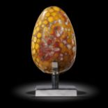 Interior Design/Minerals: A cobra jasper egg on stand, India, the egg 25cm high